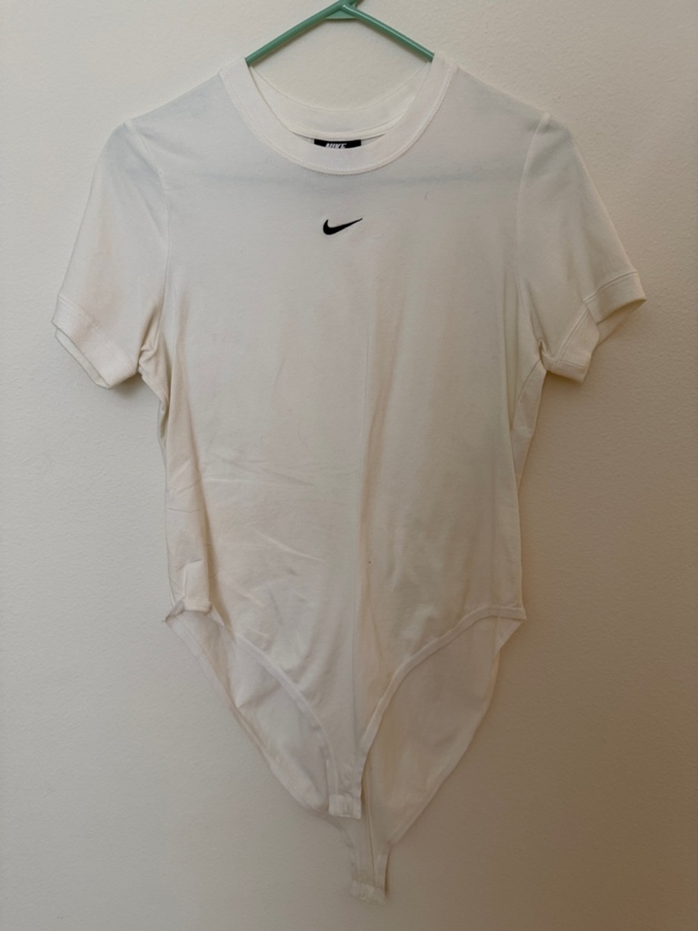Nike White Short-Sleeve Bodysuit with Black Swoosh